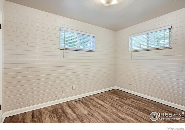 1308 Castlerock Dr, Fort Collins, CO 80521 - empty room featuring hardwood / wood-style flooring