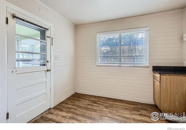 1308 Castlerock Dr, Fort Collins, CO 80521 - unfurnished dining area featuring dark hardwood / wood-style flooring
