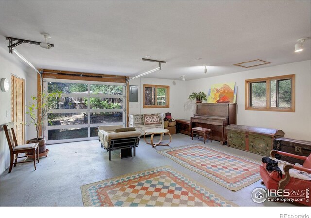 living room featuring concrete floors