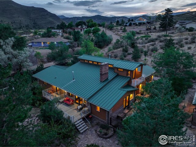 aerial view at dusk with a mountain view