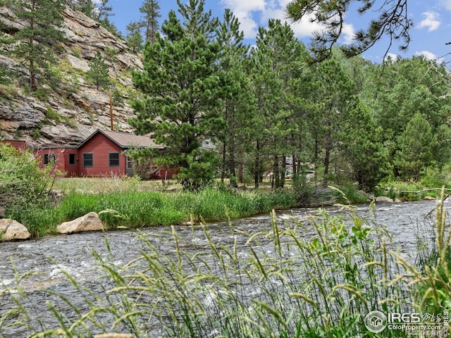 view of yard with a water view