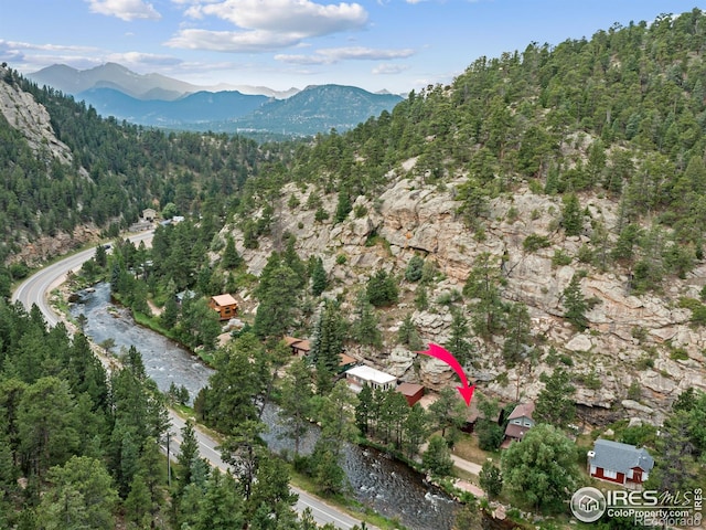 bird's eye view with a mountain view