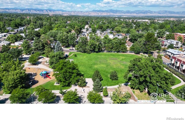 birds eye view of property featuring a mountain view