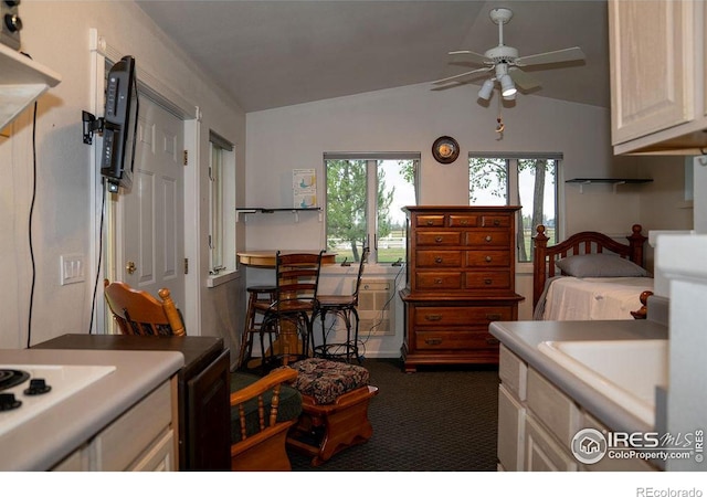 carpeted bedroom featuring lofted ceiling