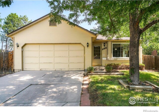 ranch-style house featuring a garage