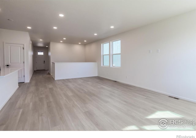 empty room featuring light hardwood / wood-style floors