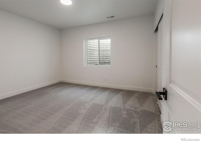 unfurnished bedroom with carpet floors