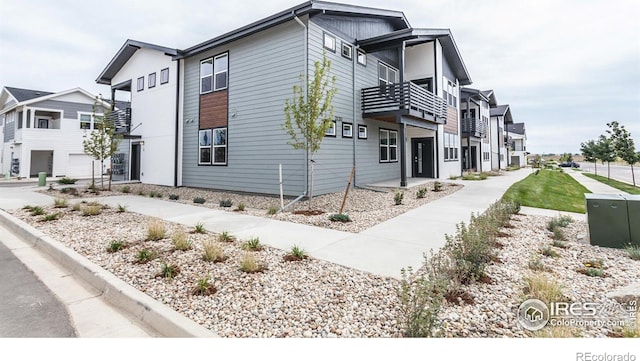 view of side of property with a garage