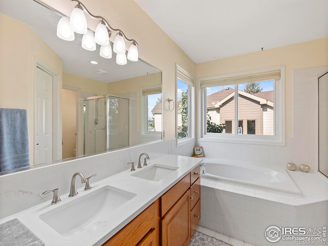 full bathroom featuring vanity, toilet, and plus walk in shower