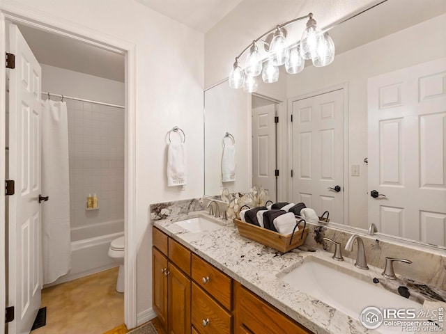 full bathroom with toilet, vanity, and shower / bathtub combination with curtain