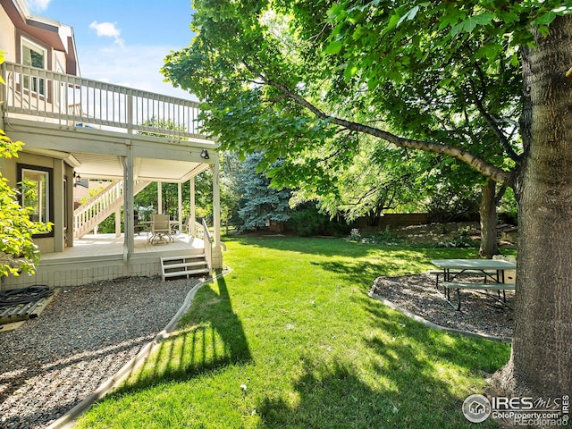 view of yard with a deck