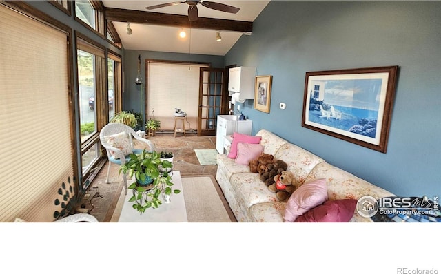 living room featuring ceiling fan, light tile patterned flooring, and vaulted ceiling with beams