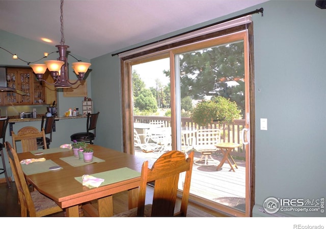 dining area with a notable chandelier