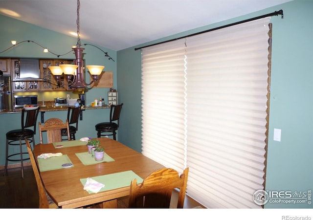 dining room featuring an inviting chandelier