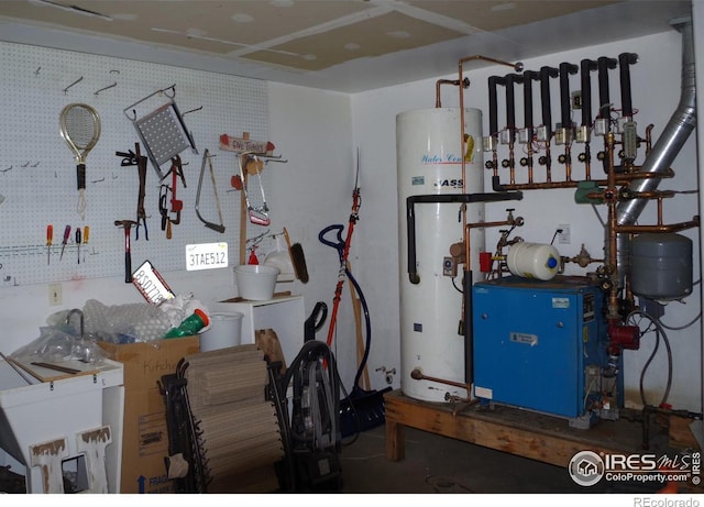 utility room with electric water heater