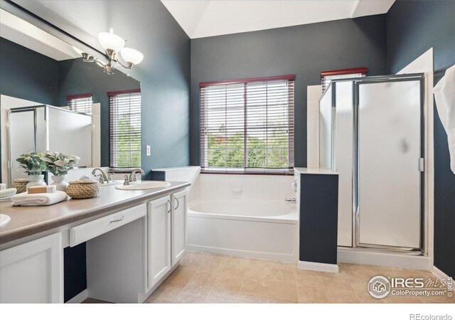 bathroom with vanity, tile patterned flooring, a chandelier, and independent shower and bath