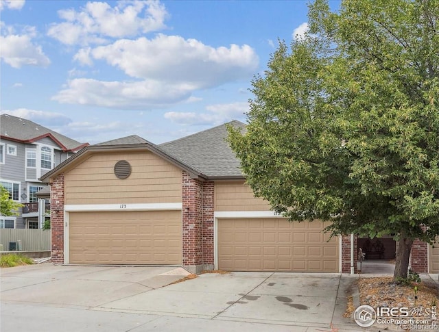 view of front of property with a garage