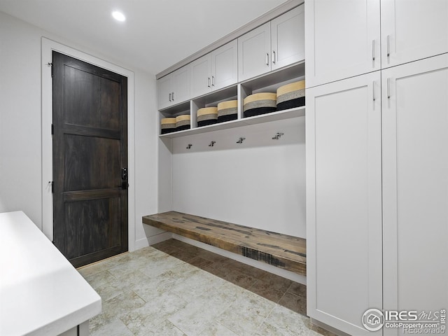 mudroom featuring light tile patterned floors