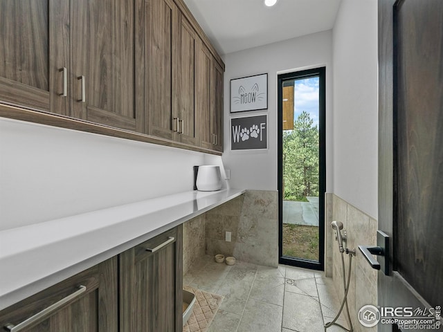 washroom featuring light tile patterned flooring