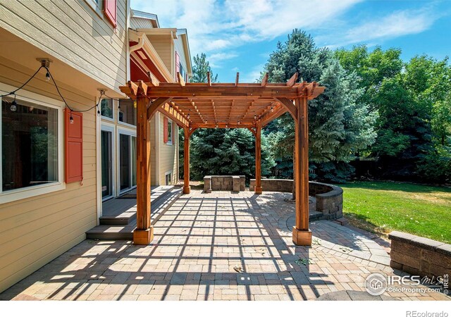 view of patio featuring a pergola