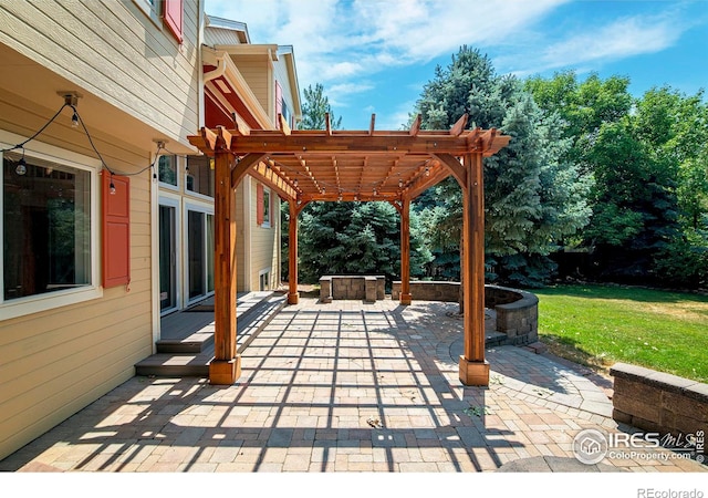 view of patio featuring a pergola