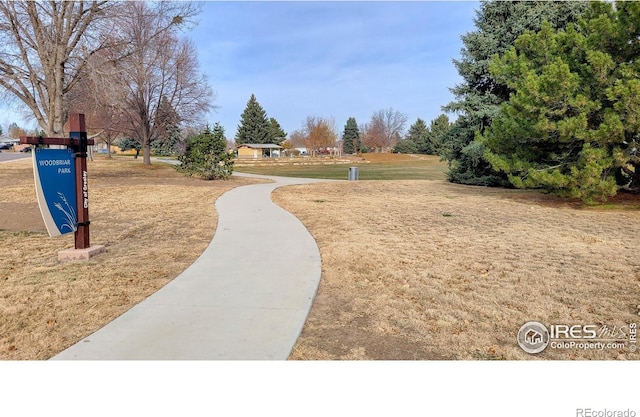 view of community featuring a lawn