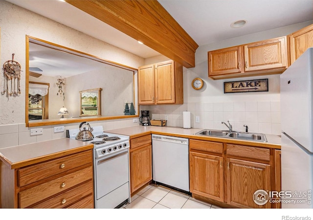 kitchen with ceiling fan, white appliances, light tile patterned floors, tasteful backsplash, and sink