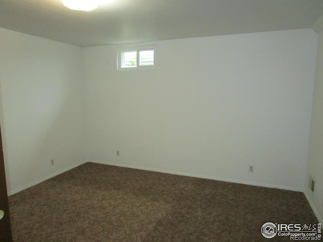 view of carpeted spare room