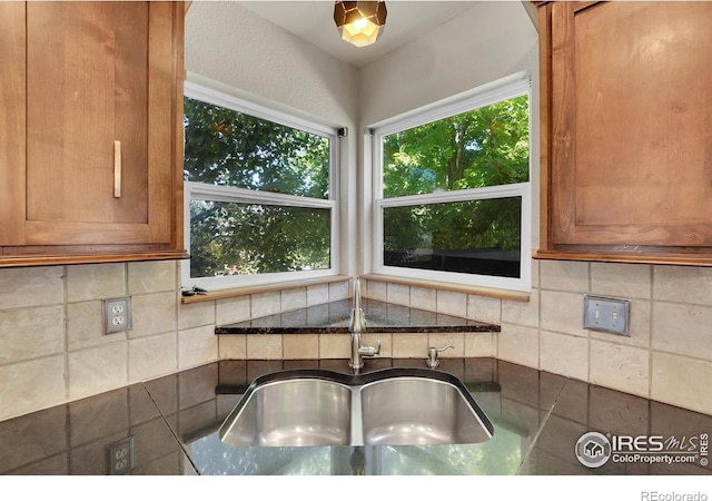 kitchen with sink and backsplash