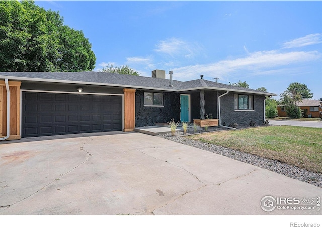 single story home with a garage