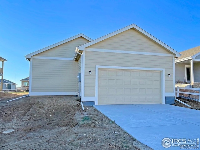 exterior space with a garage