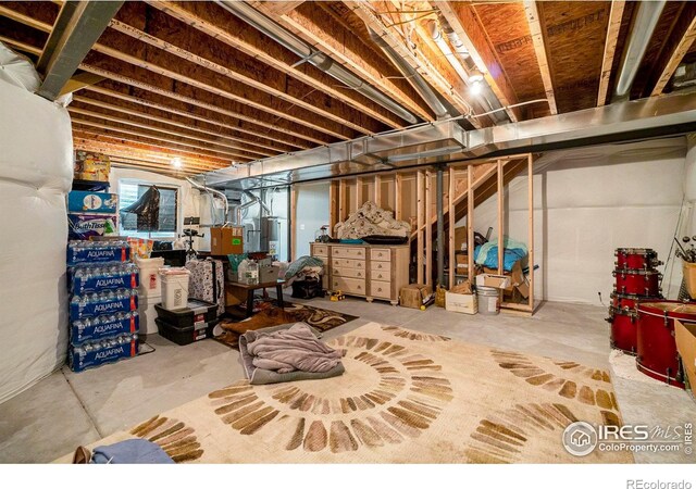 basement featuring gas water heater