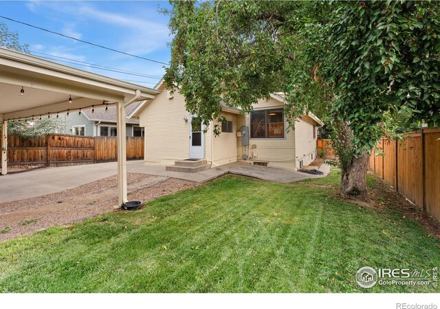 view of yard with a patio area