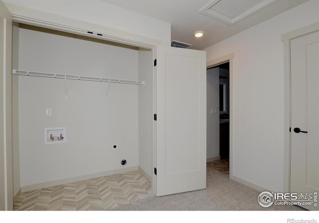 laundry area featuring light carpet, hookup for an electric dryer, and washer hookup