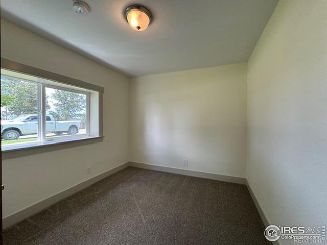 empty room with carpet floors