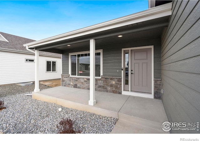 3288 Buffalo Grass Ln, Wellington, CO 80549 - property entrance featuring stone siding