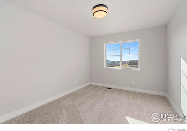 3288 Buffalo Grass Ln, Wellington, CO 80549 - unfurnished room with light colored carpet and baseboards