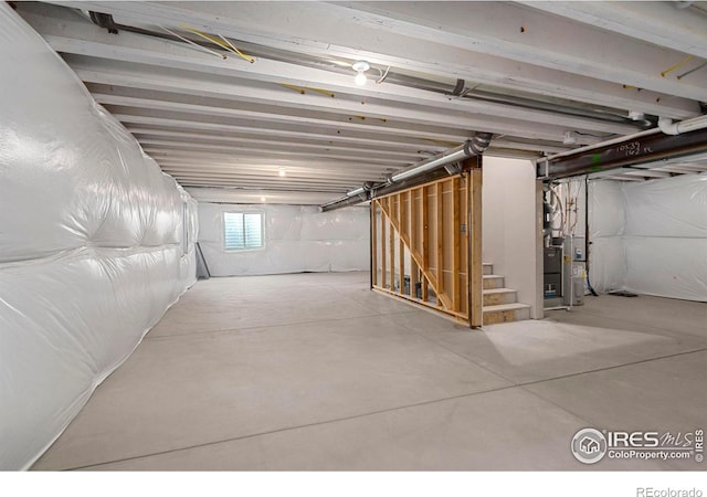 3288 Buffalo Grass Ln, Wellington, CO 80549 - basement with stairs and water heater