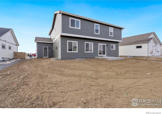 3288 Buffalo Grass Ln, Wellington, CO 80549 - back of property with a patio area