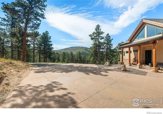 view of patio featuring a mountain view