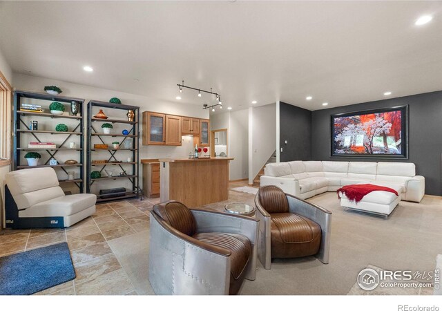 tiled living room with rail lighting