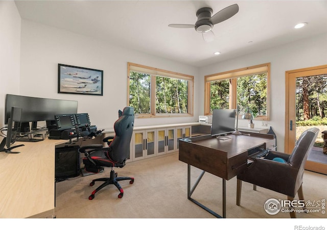 home office with recessed lighting, a ceiling fan, and light colored carpet