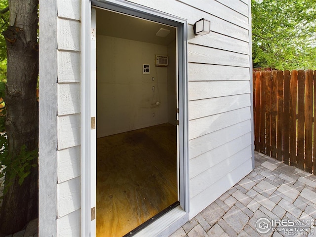 entrance to property with an AC wall unit