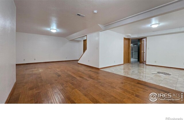 2720 E 121st Pl, Thornton, CO 80241 - interior space featuring baseboards, hardwood / wood-style floors, and visible vents