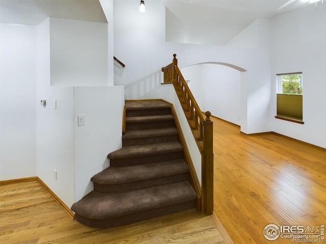 2720 E 121st Pl, Thornton, CO 80241 - staircase featuring wood finished floors