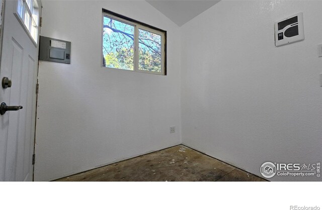 2720 E 121st Pl, Thornton, CO 80241 - unfurnished room with concrete flooring and lofted ceiling