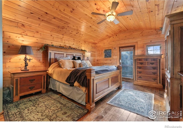 bedroom featuring wooden ceiling, vaulted ceiling, dark wood-type flooring, and ceiling fan