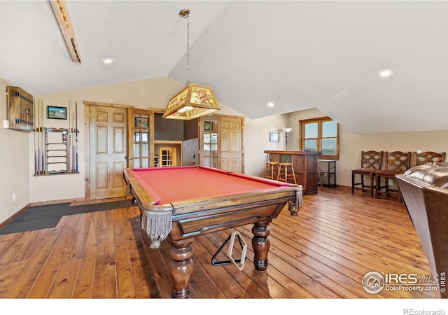 rec room with pool table, hardwood / wood-style flooring, and lofted ceiling