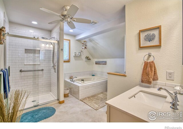 bathroom with tile patterned flooring, ceiling fan, shower with separate bathtub, and vanity