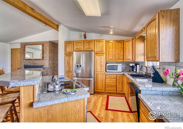 19150 E 195th Ave, Hudson, CO 80642 - kitchen with tile countertops, a sink, stainless steel fridge, and white microwave